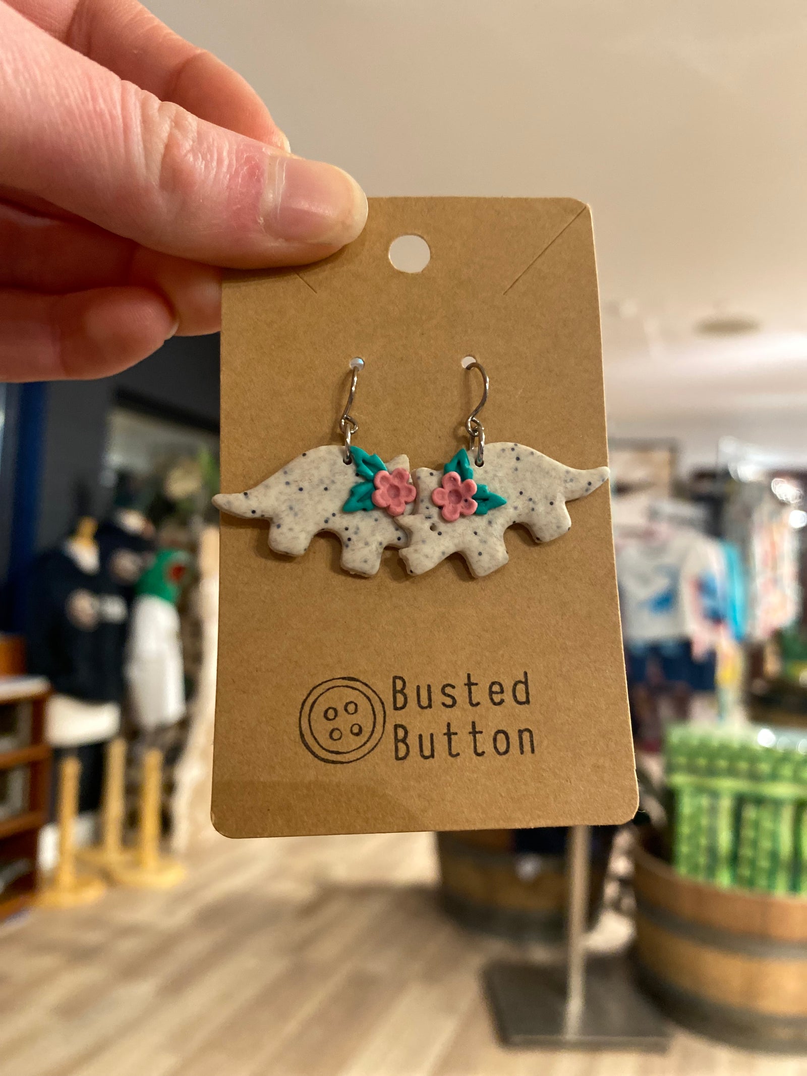 Triceratops flower earrings