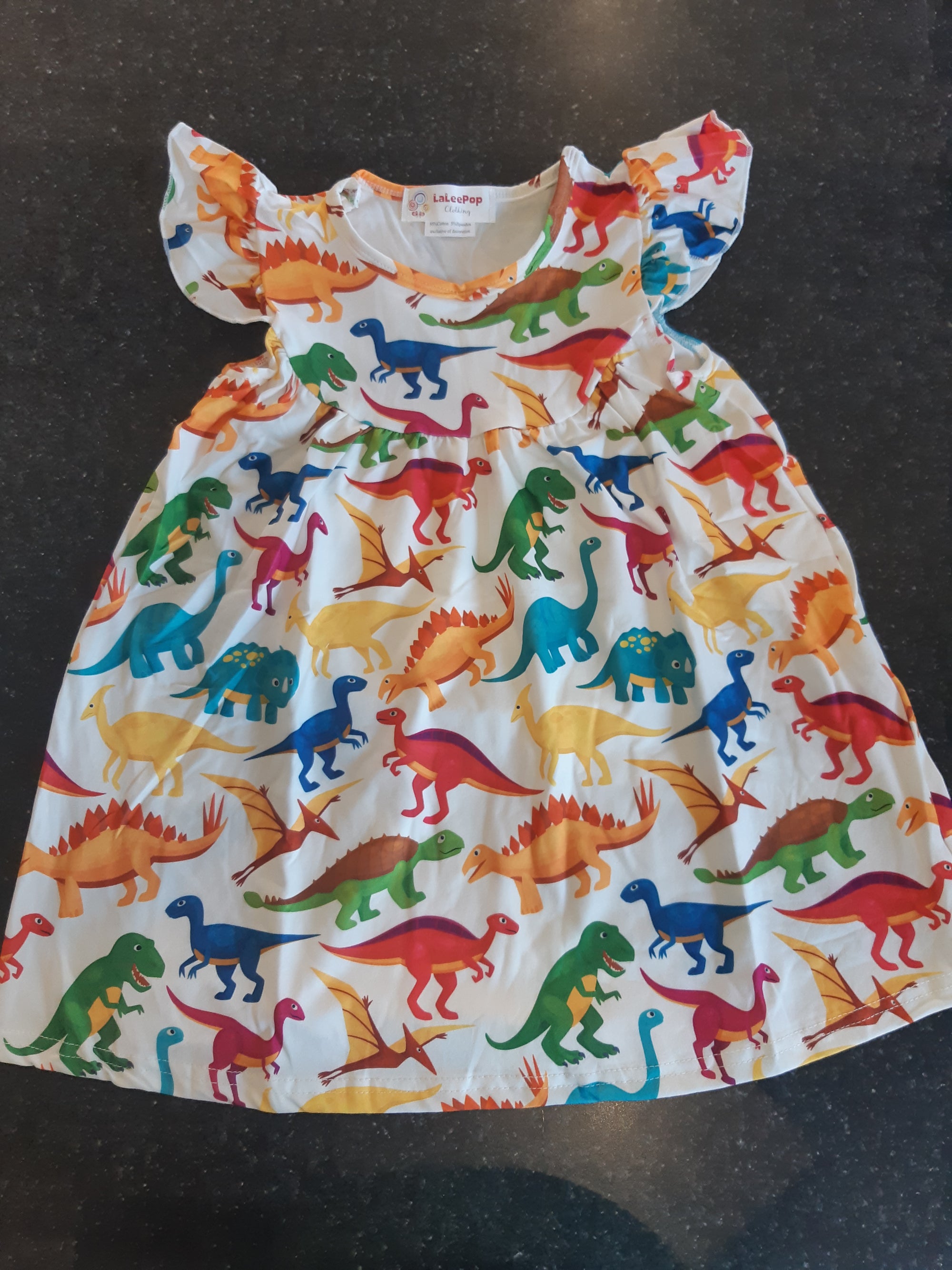 dinosaur dress and Accessory Collection For Girls- Princess Awesome Display dress is a size 3t on a size 3t mannequin Dinosaur Dress For Adults