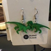Toy earrings T.rex